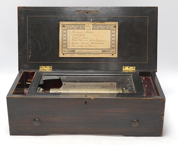 A 19th century Swiss six air music box, 43cm wide. Condition - poor but working